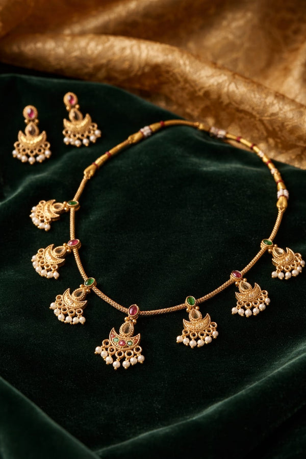 Gold Chandbali Necklace Set with Pearl Drops